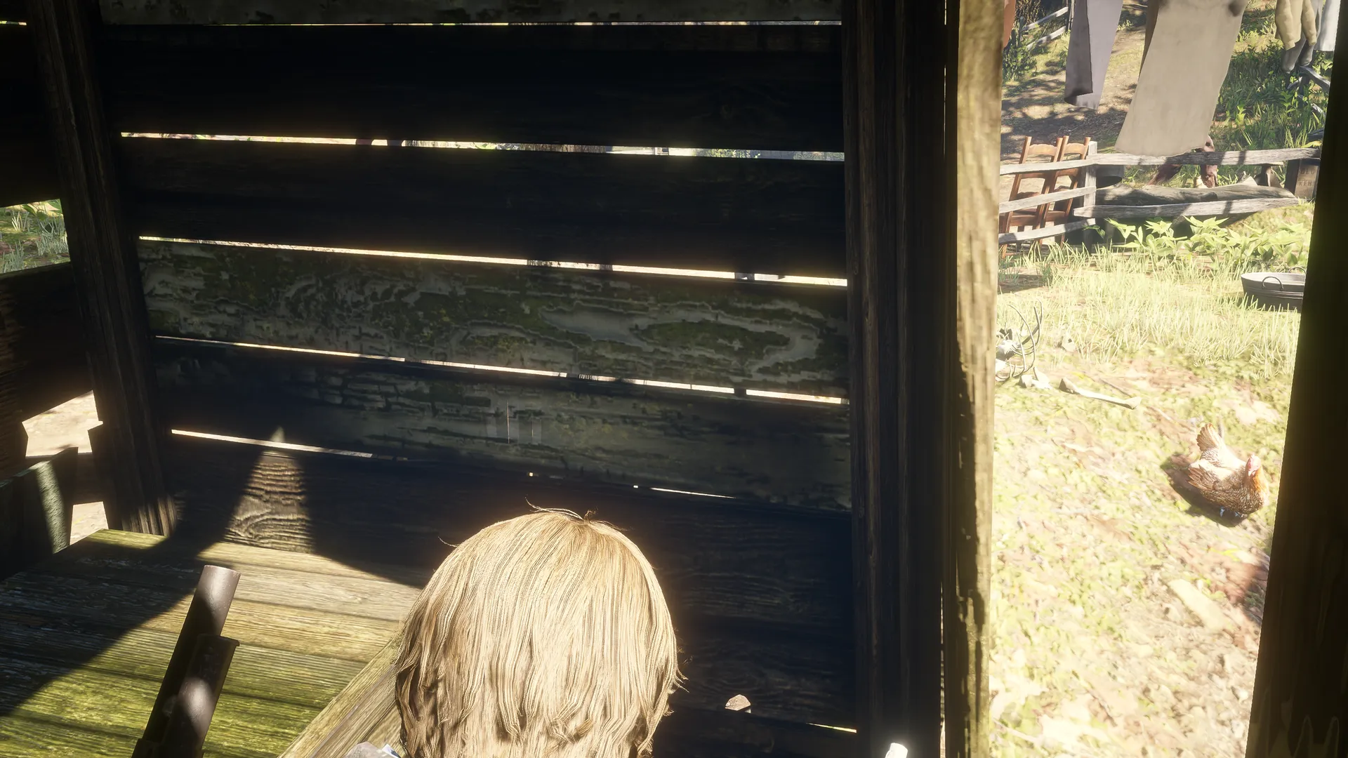 Arthur's over-the-shoulder view inside Outhouse 3, facing three faint white tally marks on a weathered wooden wall.