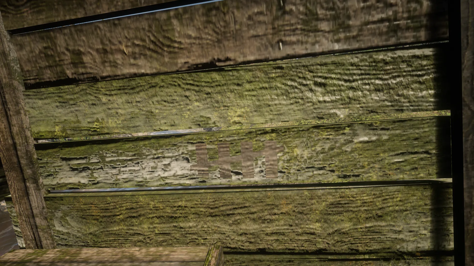 Free-camera close-up of five vertical tally marks crossed by a diagonal stroke on the weathered interior boards of Outhouse 5.